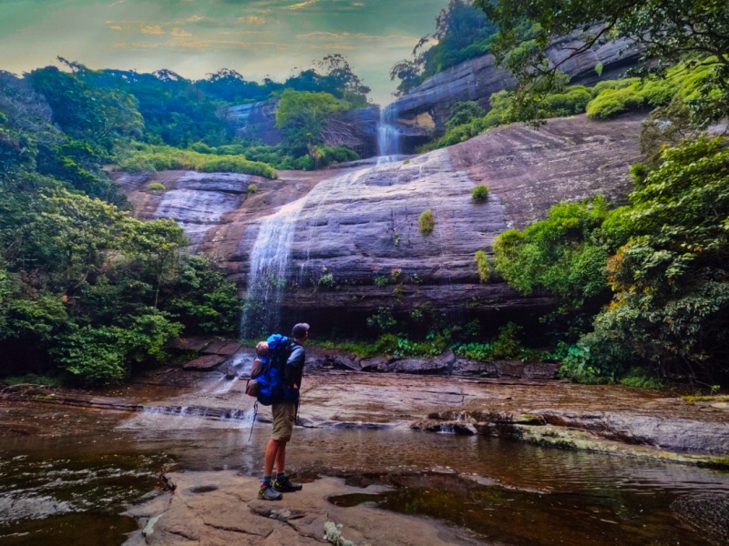 Mand Standing next to Duwili Ella Waterfall, Things to do in Sri Lanka