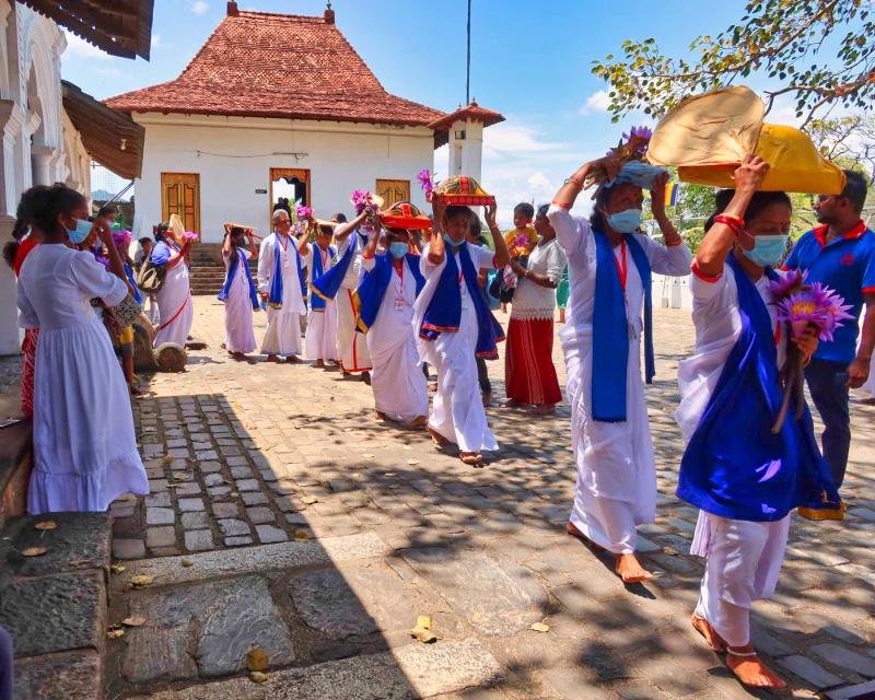 Pilgrims walking through temple - Sri Lanka Travel Guide