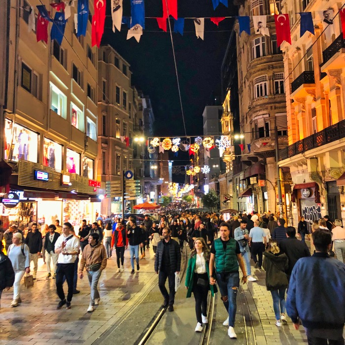 Tourists walking down Istikal Street, one of the coolest neighborhoods in Istanbul