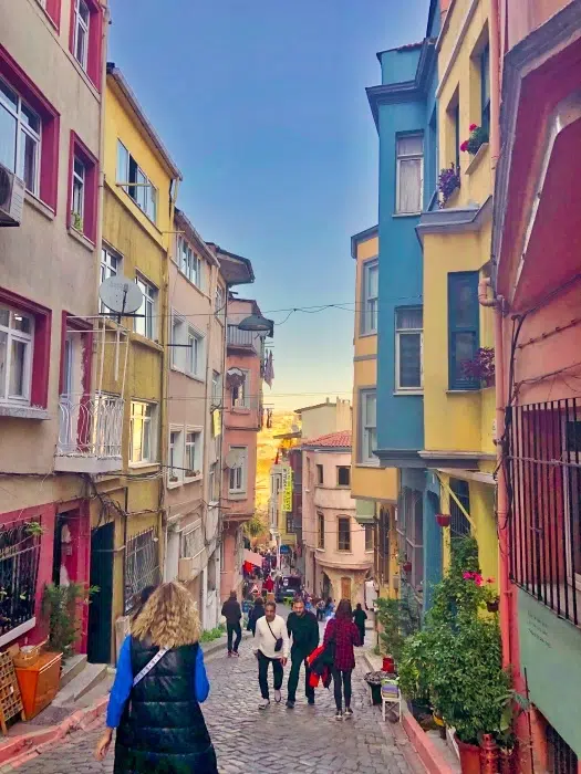 Tourist walk through the street of Balat - A hipster area in Istanbul 