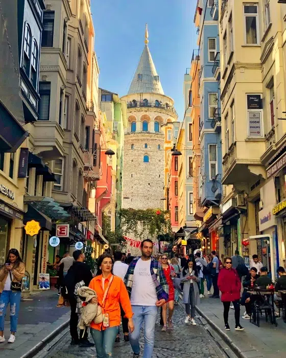 Tourists walking near Galat Torwe, one of the coolest neighborhoods in Istanbul