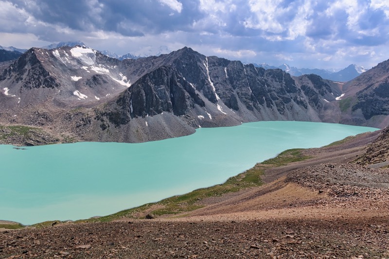 The view of Ala Kul Lake from descending the pass