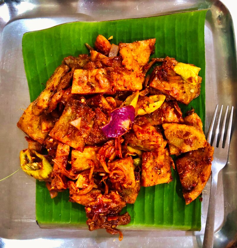 Eating delicious food like this plate of kottu is one of the best things to do in North Sri Lank