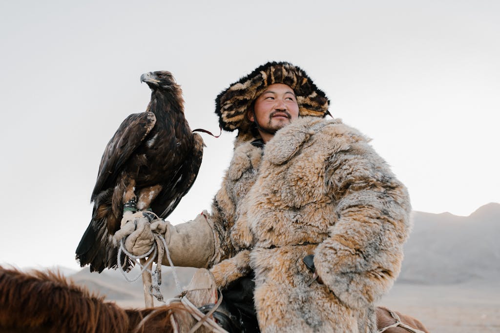 A Man in Fur Jacket with Golden Eagle